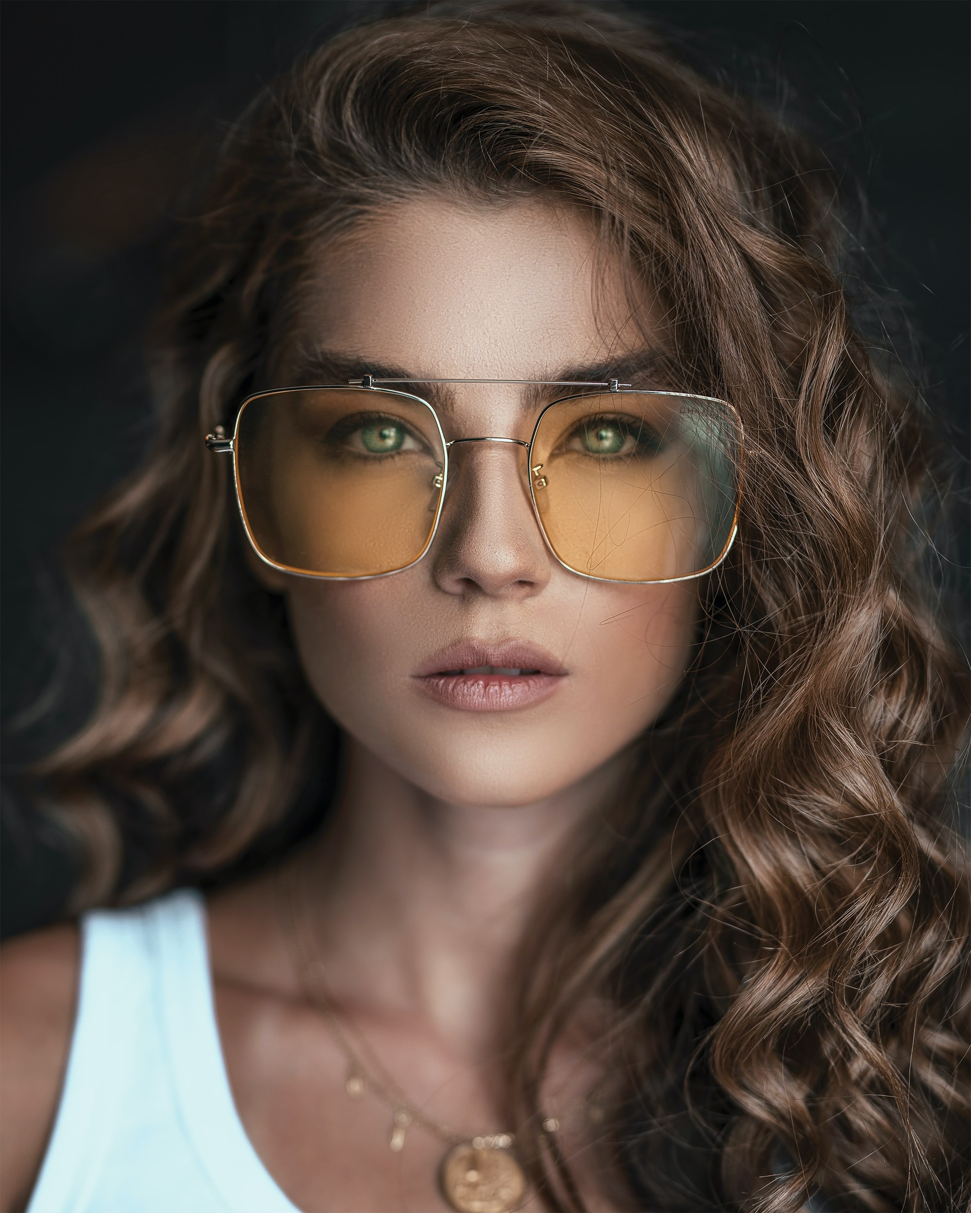 Woman wearing distinctive OptoDoc frames